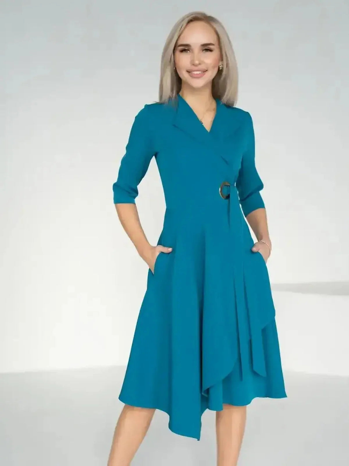 Elegant Sea Grace Midi Dress in sea wave teal, featuring a tailored wrap style and flattering A-line silhouette.