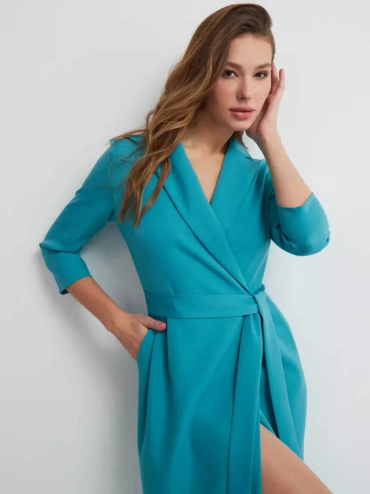 Elegance Wrap Midi Dress in turquoise, featuring a belted waist and notched lapels, perfect for weddings or formal occasions.