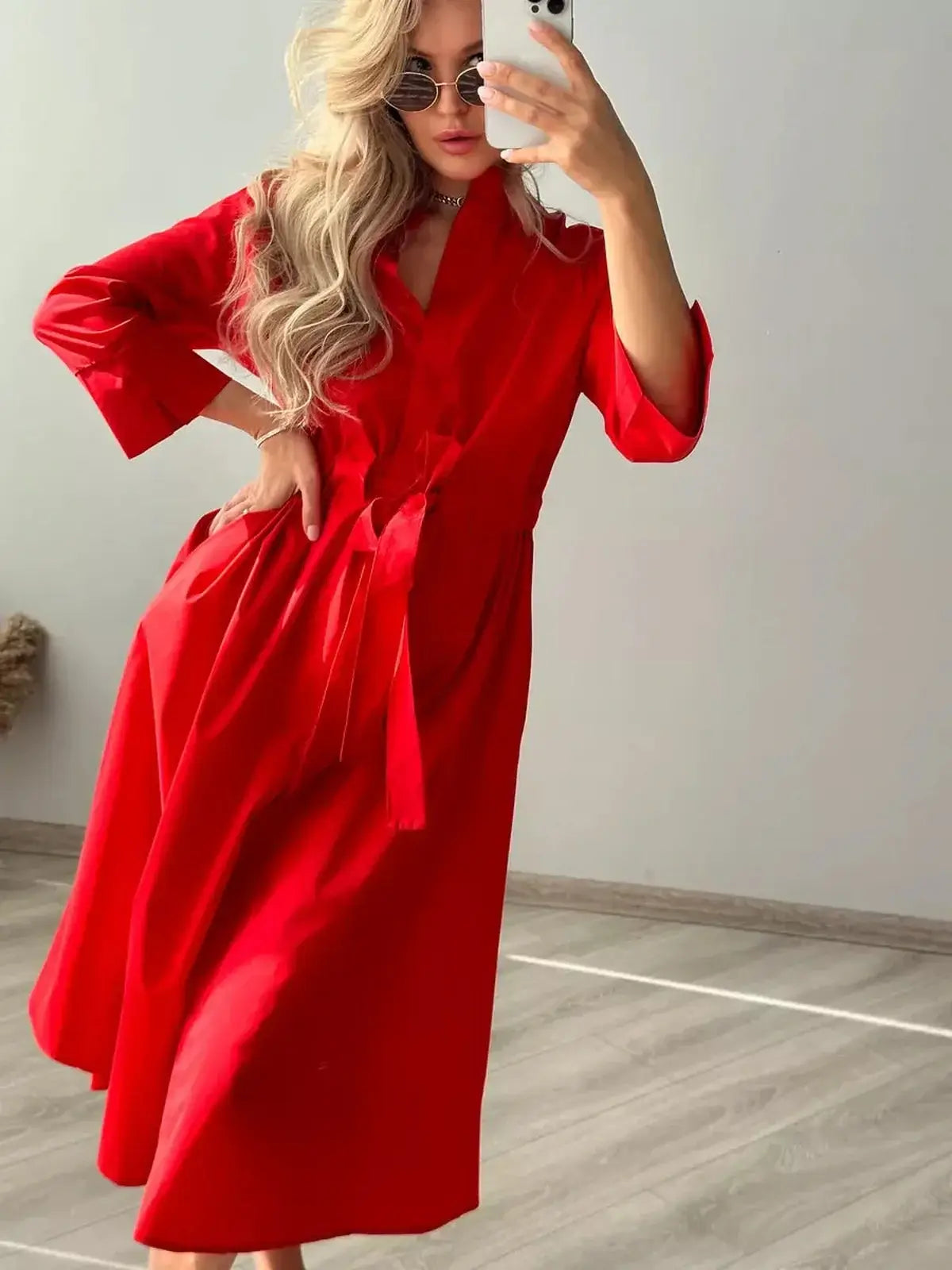 Crimson Ease Midi Dress in vibrant red, showcasing a stylish silhouette perfect for weddings, parties, and casual outings.