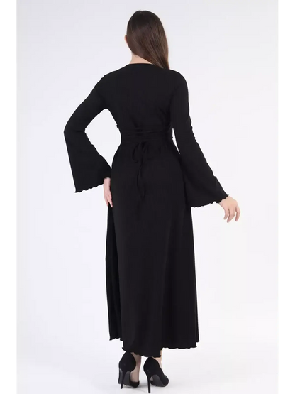 Back view of the Noir Flare Midi Dress showcasing its stylish long bell sleeves and elegant silhouette.