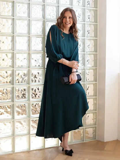 Cascade Midi Dress featuring elegant shoulder cutouts, draped fabric, and a stylish sash belt for a refined look.