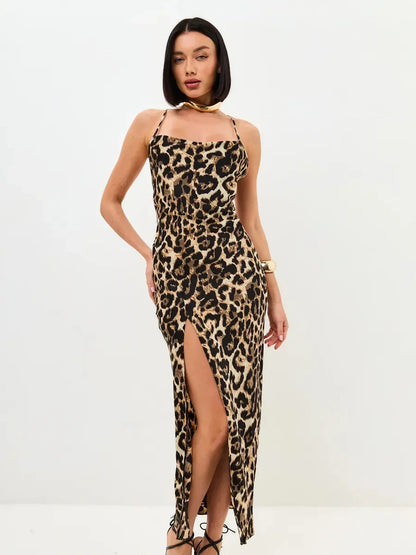 Savage Slip Midi Dress in leopard print featuring a sultry slit and chic strappy design, perfect for formal occasions.