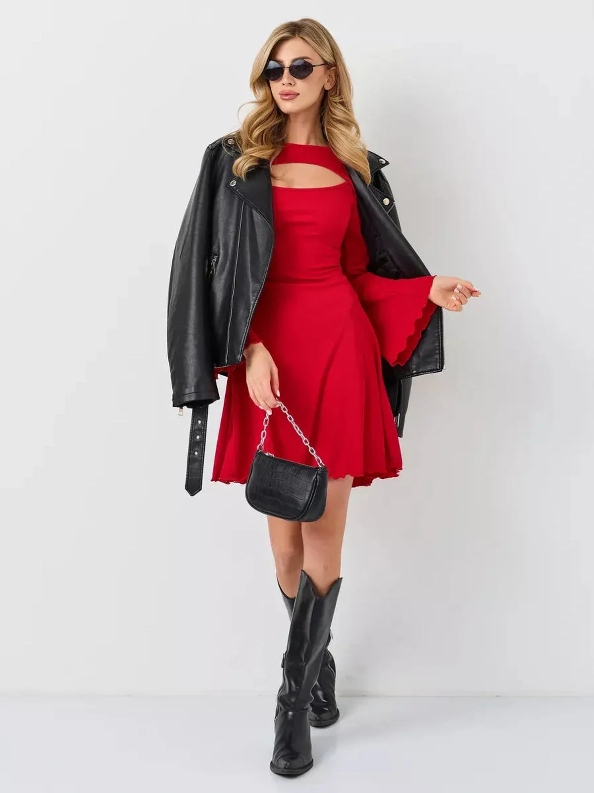 Flare cutout mini dress in red, styled with a leather jacket and cowboy boots, perfect for summer outings and special occasions.