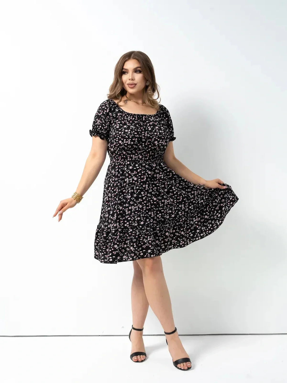 Black floral off-shoulder dress with puff sleeves, perfect as summer, cocktail, or wedding guest attire for women.