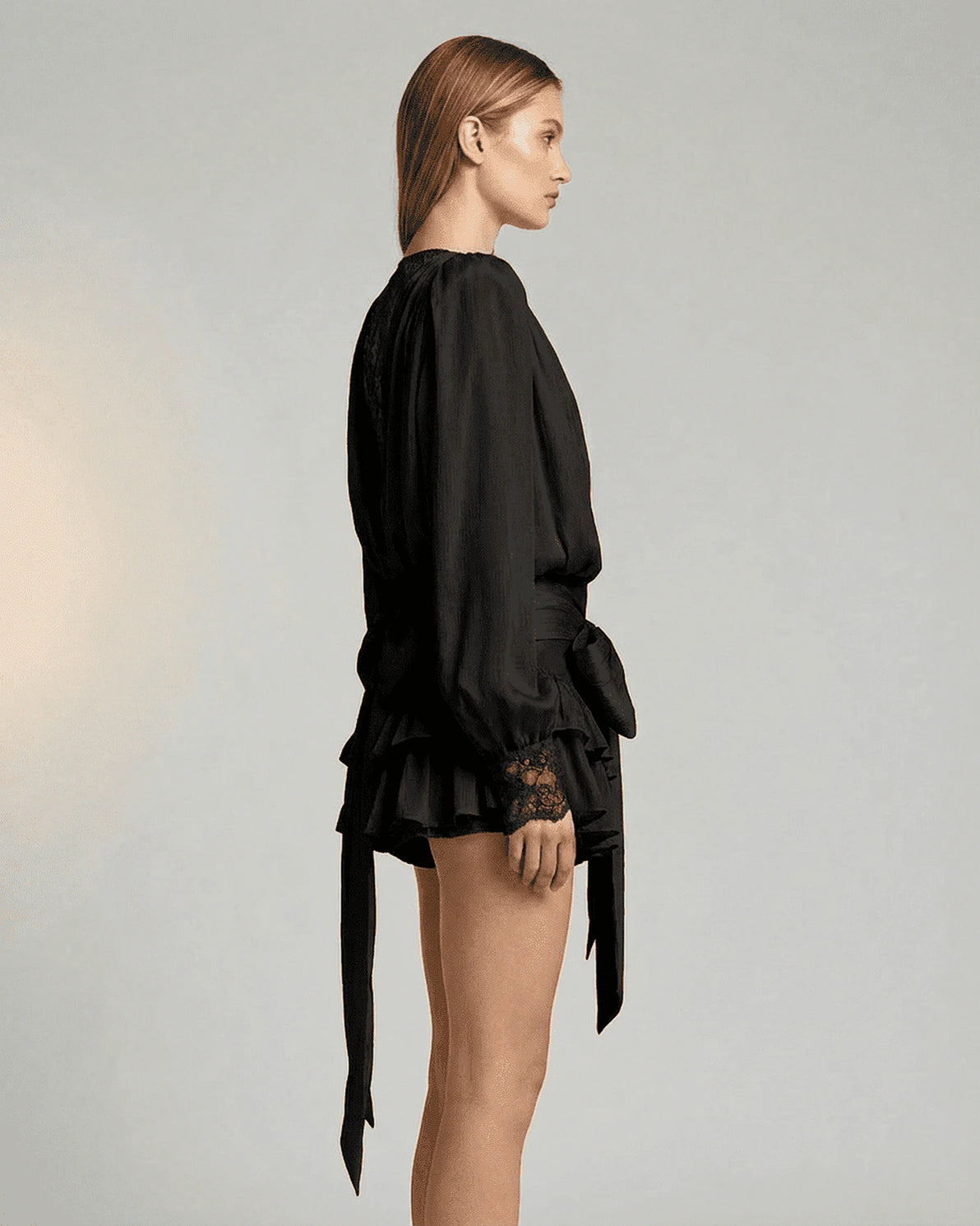 Noir Mini Dress – Black Lace V Neck mini dress, back view by Slimona