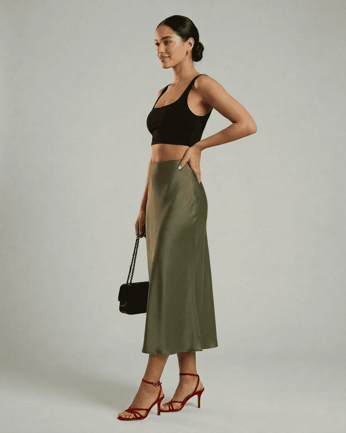 Olivia Midi Skirt – Olive Satin midi skirt, back view by Slimona