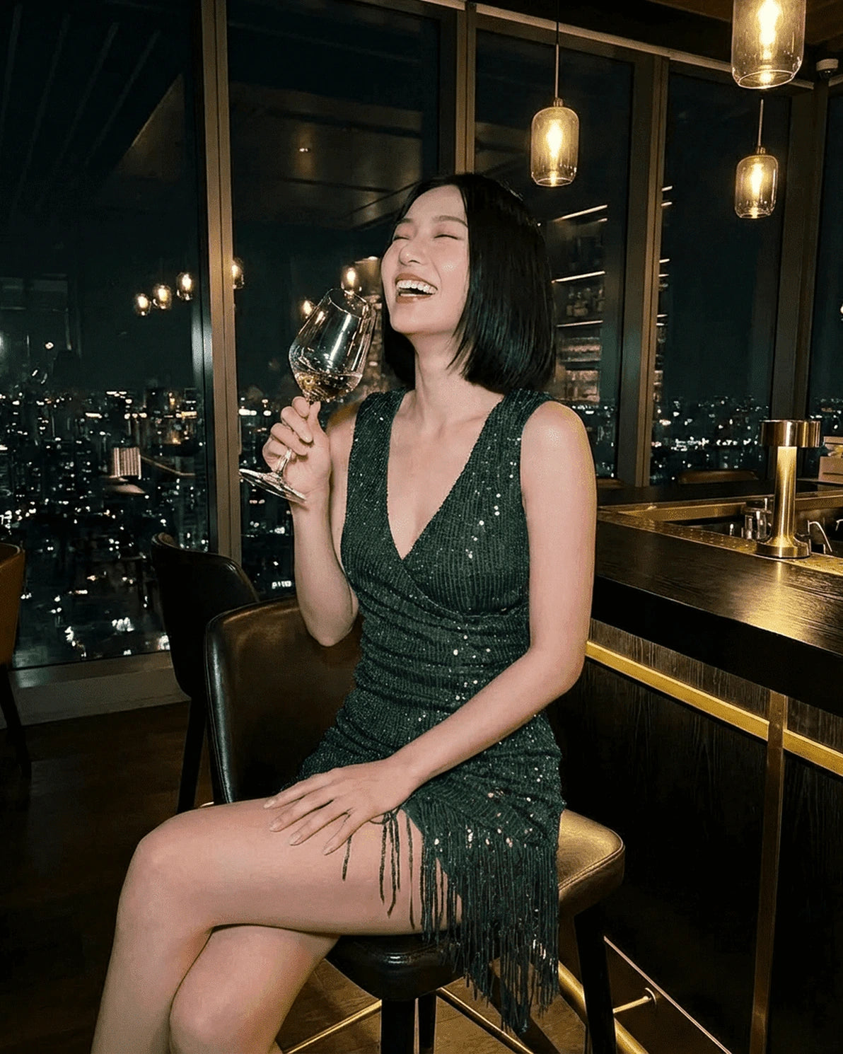 Emerald Mini Dress – Emerald Sequin V Neck mini dress, model wearing by Slimona
