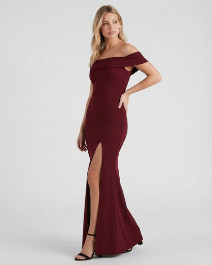 Slimona Kate Maxi Dress in burgundy, elegant off-the-shoulder design with a thigh-high slit.