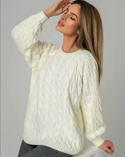 Alabaster Sweater by Slimona, oversized cream cable knit sweater showcasing cozy elegance.