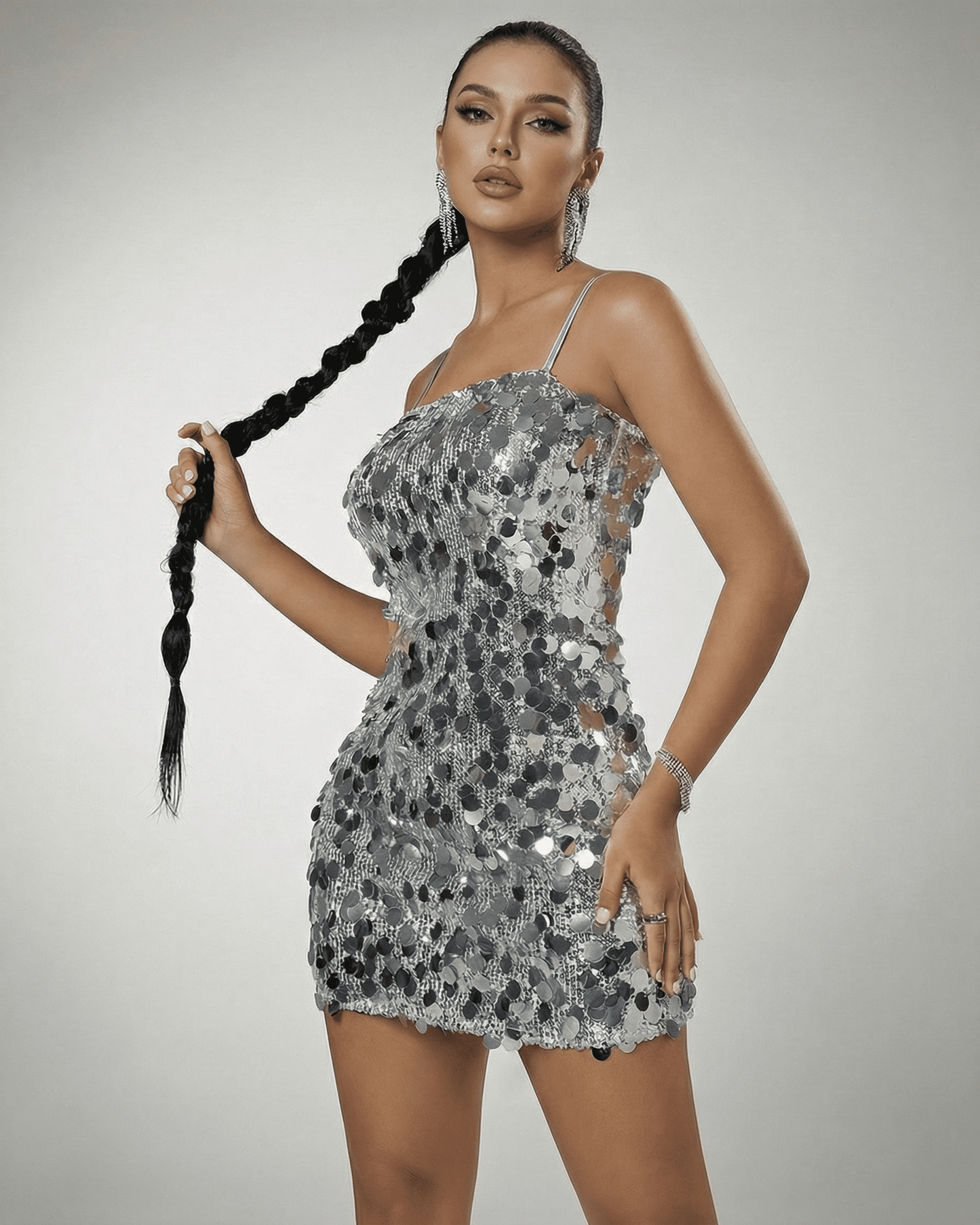 Stella Mini Dress by Slimona, silver sequin off-the-shoulder mini dress featuring a high waist silhouette.