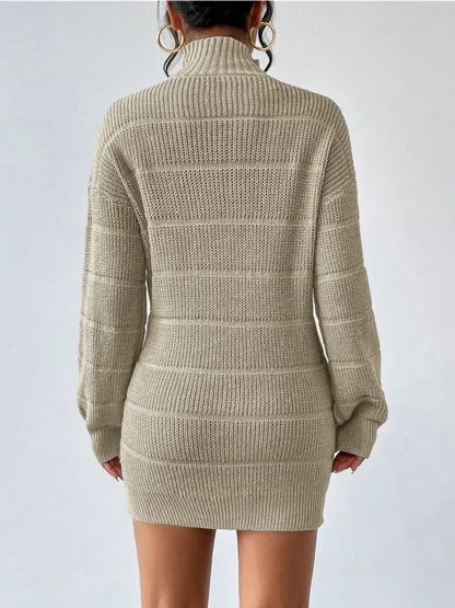 Beige ribbed knit mini dress with mock neck and long sleeves, perfect for cool-weather occasions.
