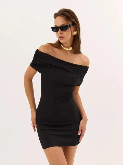 Model wearing a stylish black bodycon dress with off-shoulder design, perfect for cocktail or party events.