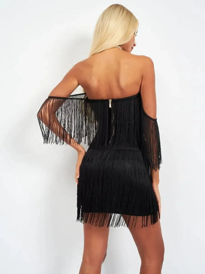 Black off-shoulder mini dress with cascading fringe, perfect for parties and special occasions.