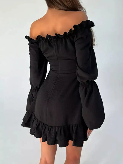 Black off-shoulder mini dress with puff sleeves and ruffle hem, perfect for parties and special occasions.