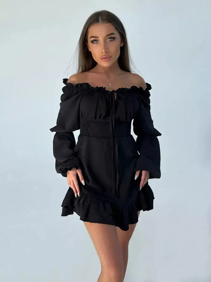 Off-the-shoulder black mini dress with ruffled details, perfect for party dresses or cocktail events.
