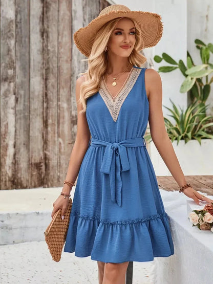 Chic Blue Mirage Mini Dress with deep V-neckline and crochet lace, perfect for summer weddings and casual outings.