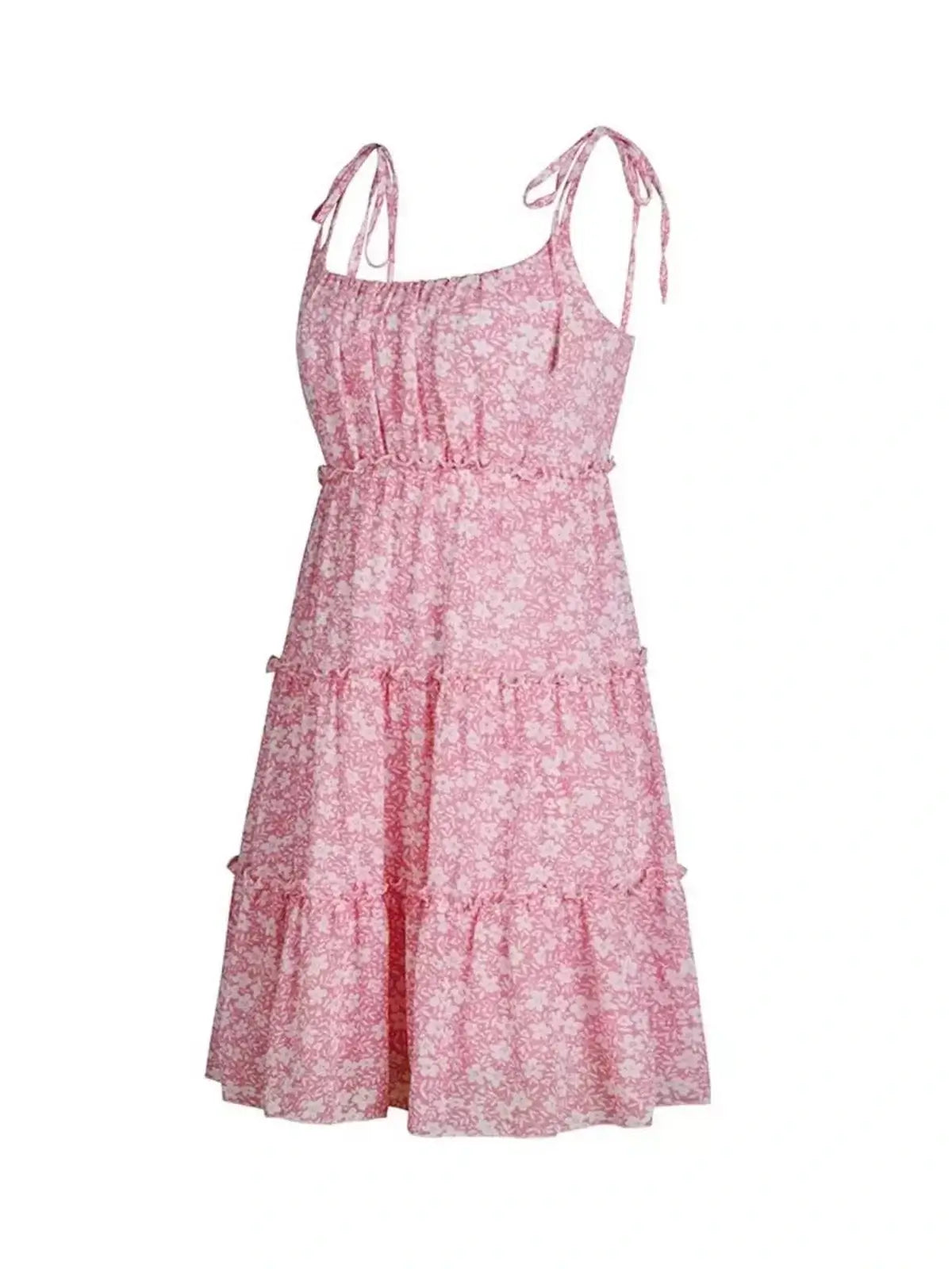 Breezy pink floral mini dress with tie straps and tiered skirt, perfect for summer outings and garden parties.