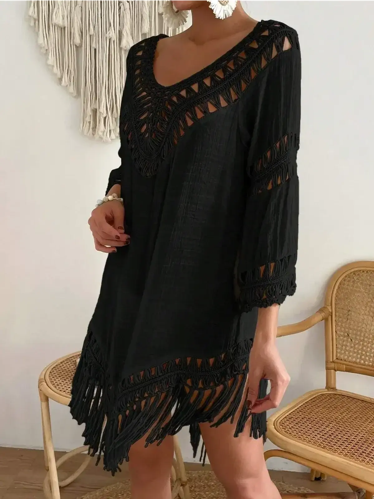 Boho Fringe black mini dress with ¾ sleeves, intricate lace trim, and fringe hem, perfect for summer occasions.