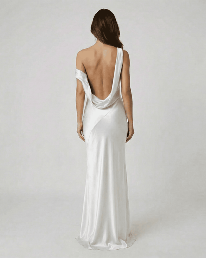 Elysia Maxi Dress by Slimona showcasing an elegant open back detail and sleek satin-effect design.