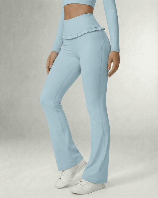 Celeste Leggings Blue by Slimona, stylish light blue flare pants with pockets, perfect for workouts and daily wear.