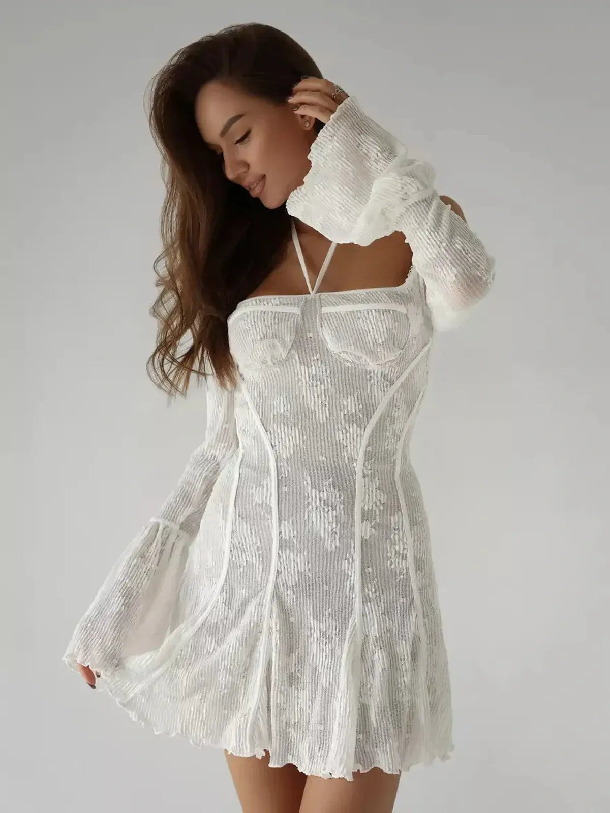 Celeste Lace white mini dress with off-shoulder bell sleeves, perfect for wedding guests and summer parties.