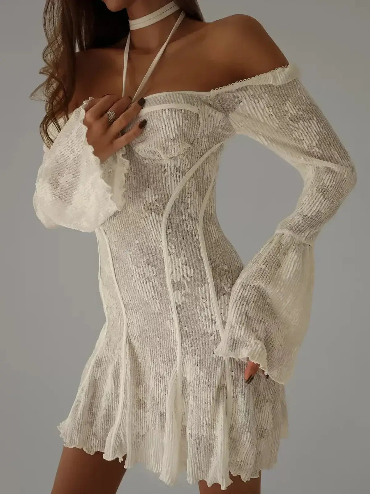 Celeste Lace white mini dress with off-the-shoulder sleeves, perfect for wedding guests and summer parties.