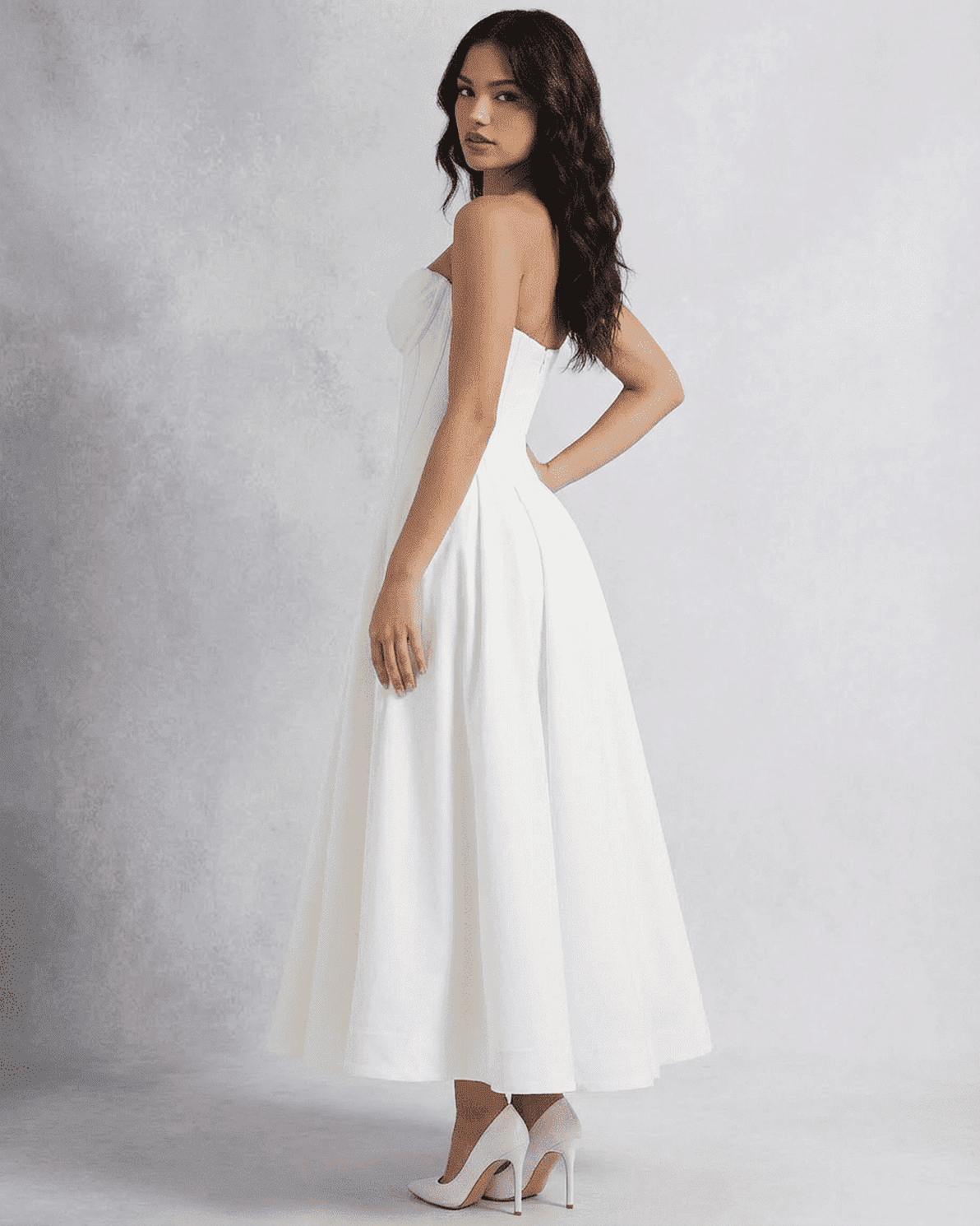 Celeste Midi Dress by Slimona - Elegant strapless A-line dress showcasing a modern silhouette in white.