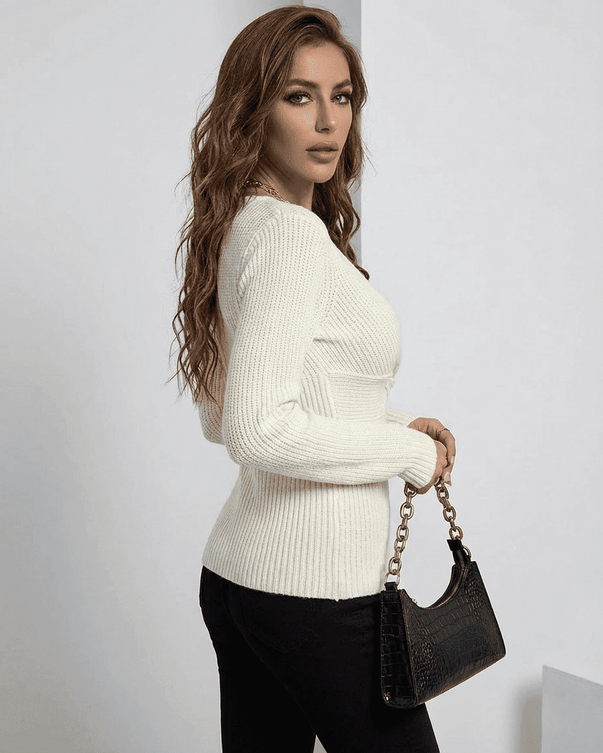 Celeste Pullover by Slimona - Slim fit ribbed ivory sweater, styled with chic handbag.