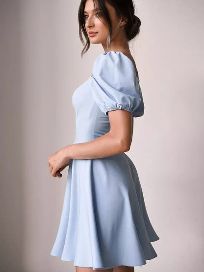 Light blue mini dress with puff sleeves, perfect for summer parties and weddings.