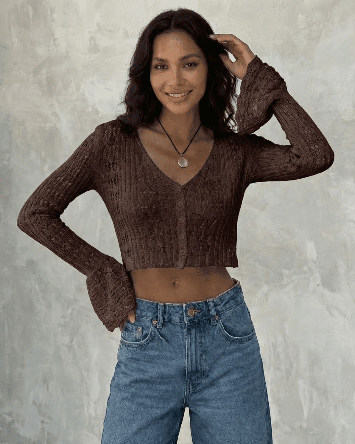 Cocoa Cardigan by Slimona, cropped cotton knit with flare sleeves, showcasing modern elegance and versatility.