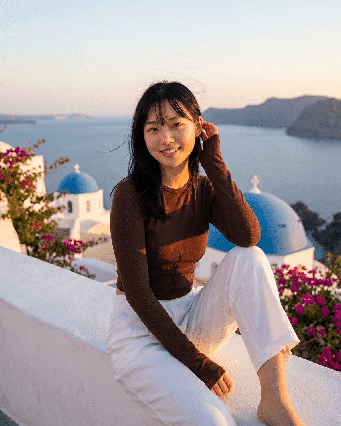 Cocoa Corset Top model in Santorini, showcasing Slimona's stylish long sleeve jersey corset crop.