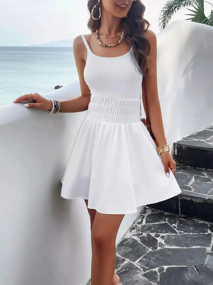 Coconut Shore Mini Dress: White summer dress featuring a flowy skirt and comfortable ribbed bodice, perfect for beach outings.