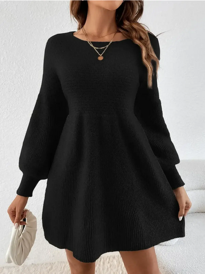Elegant black long sleeve mini dress with balloon sleeves, perfect for weddings and parties.