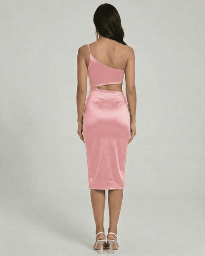 Back view of Rosalia Midi Dress by Slimona, featuring a one-shoulder design and sculpted cutout in soft pink satin.