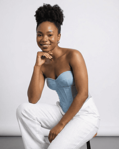 Denali Corset Top by Slimona in faux denim, featuring structured slim design and a modern bustier style.