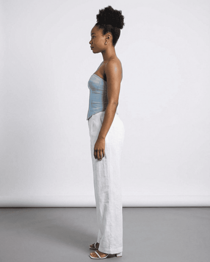 Denali Corset Top by Slimona, showcasing a blue faux denim cup bustier in a side profile view.