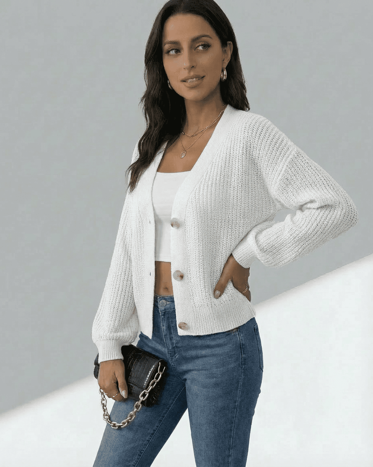 Elara Cardigan by Slimona, women's lightweight button-front knitwear in white, styled with jeans.
