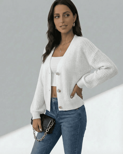 Elara Cardigan by Slimona, women's lightweight button-front knitwear in white, styled with jeans.