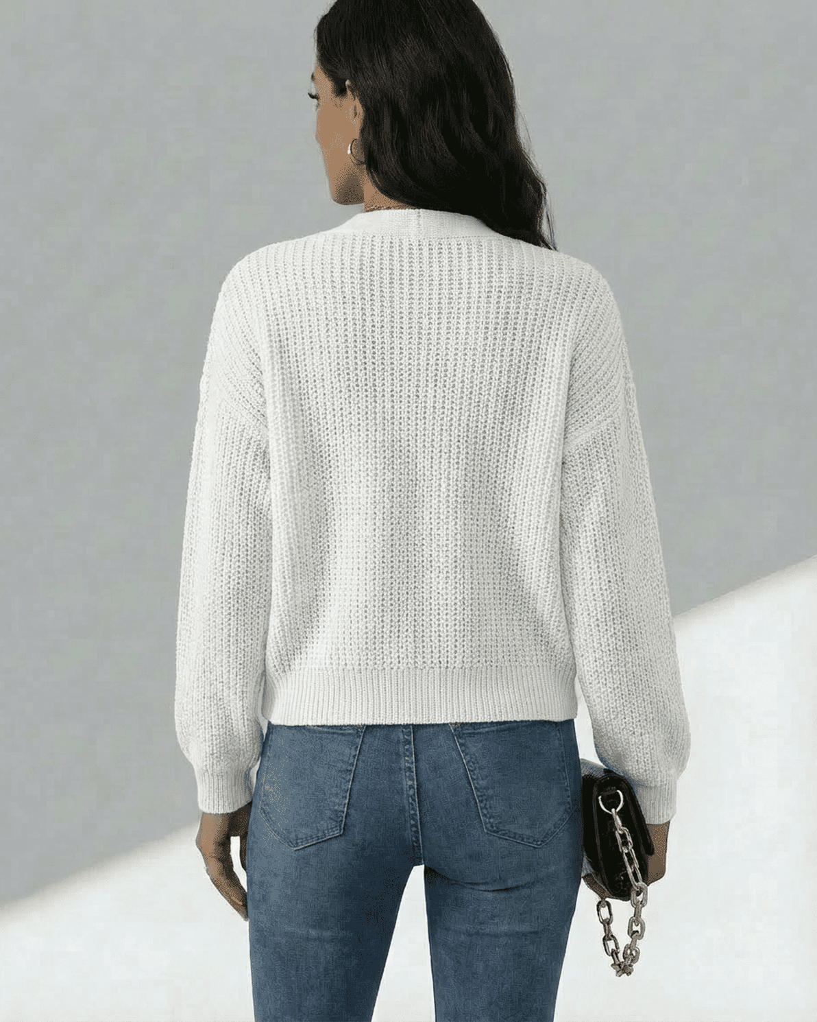 Elara Cardigan by Slimona displayed from the back, featuring a lightweight knit texture and relaxed silhouette.