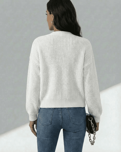 Elara Cardigan by Slimona displayed from the back, featuring a lightweight knit texture and relaxed silhouette.