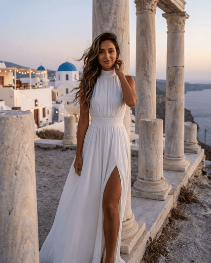 Elara Maxi Dress by Slimona in elegant white, featuring sleeveless turtleneck design and side slit
