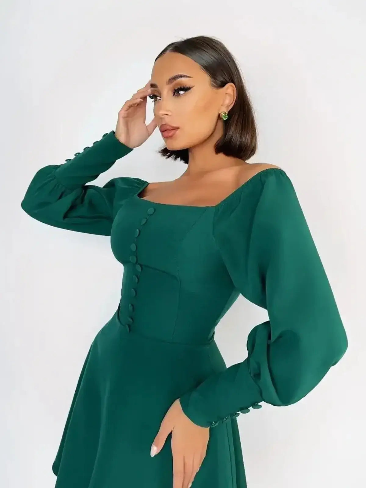 Emerald Era Mini Dress featuring a square neckline and long puff sleeves, perfect for summer and weddings.