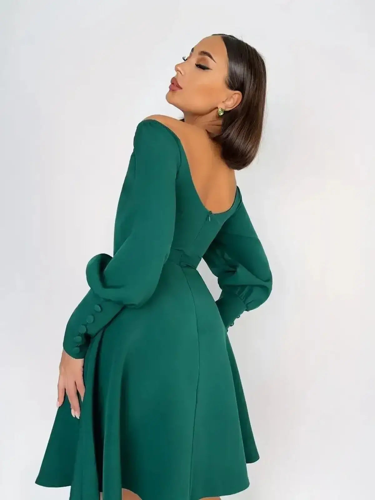 Emerald Era Mini Dress featuring a square neckline and long sleeves, perfect for weddings and party events.