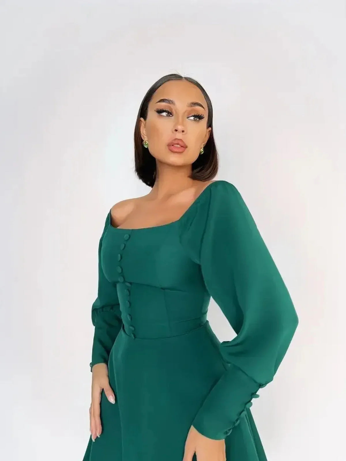 Emerald Era Mini Dress with square neckline and long sleeves in opulent green, perfect for summer and wedding guest occasions.