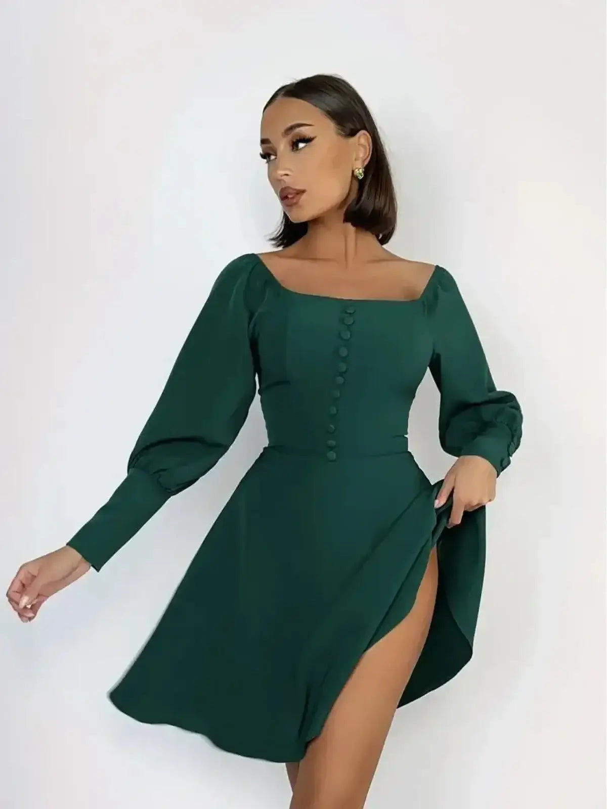 Emerald Era Mini Dress featuring a square neckline and structured long sleeves, perfect for wedding guests and summer parties.