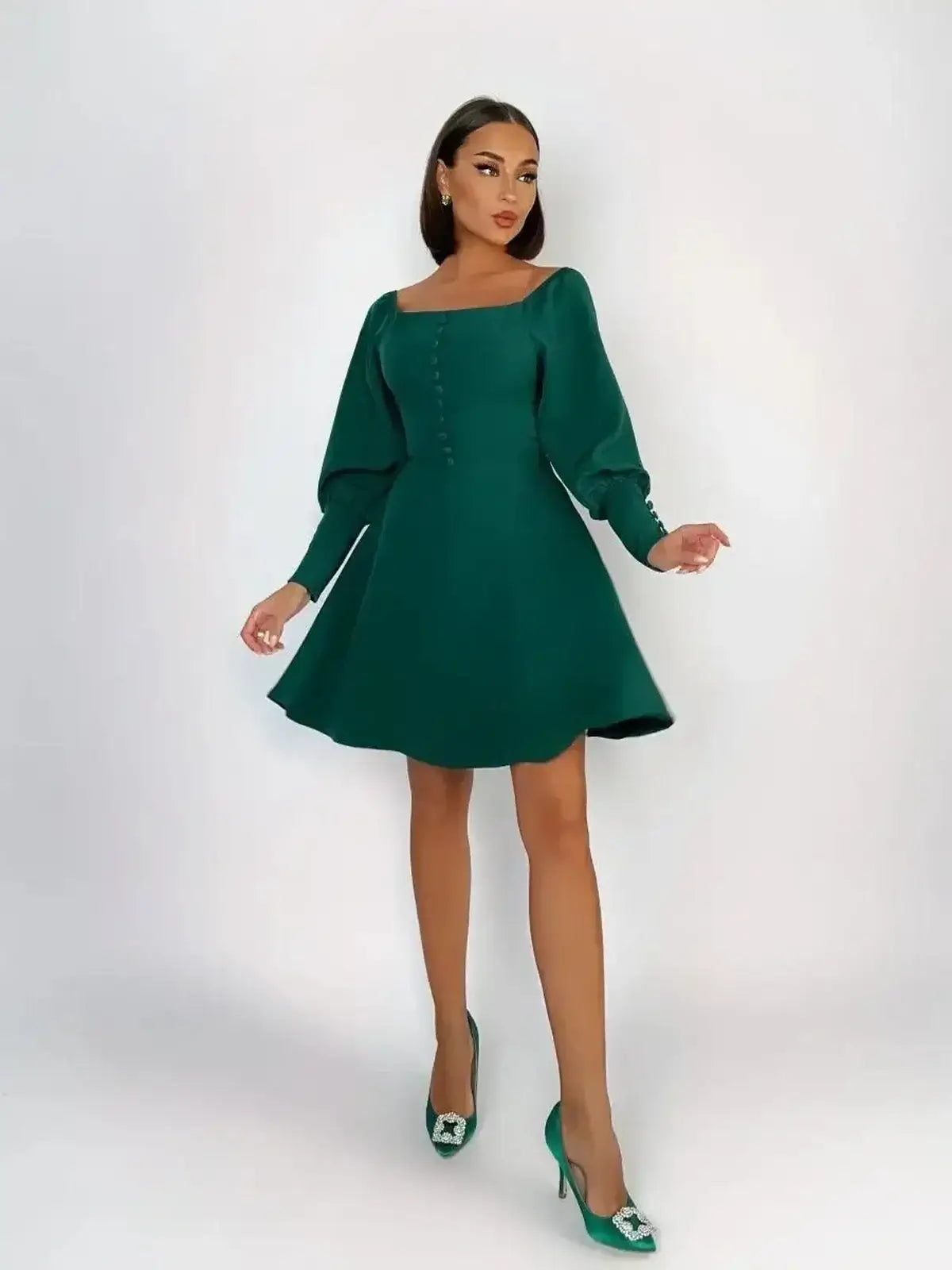 Emerald Era Mini Dress featuring a square neckline and structured long sleeves, perfect for wedding guests and summer occasions.