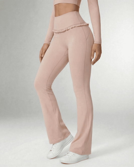 Serena Leggings by Slimona, elegant flare pants with pockets in soft pink, perfect for casual wear and active days.