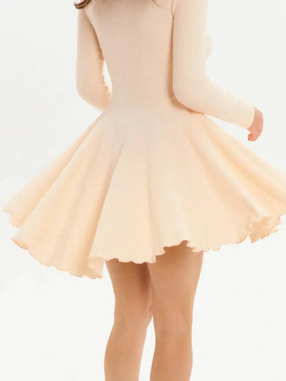 Flare Fit Mini dress in soft beige with a playful flared skirt and long sleeves, perfect for summer occasions and parties.