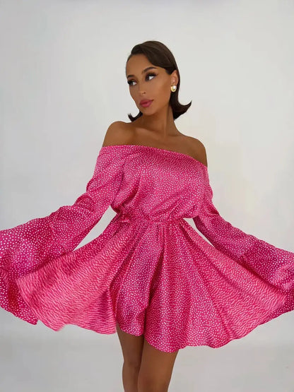 Flirt Pulse Mini Dress in vibrant pink with white polka dots, featuring flared sleeves and an off-the-shoulder design.