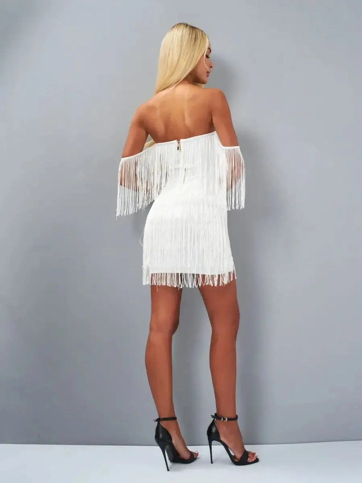 White fringe mini dress with off-the-shoulder style, perfect for summer parties and weddings.